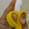 BABYTOOTHBRUSH-TEETHER-BANANA-YELLOW.LEFT Infaneo Baby Banana Teether Toothbrush - 8018 - Yellow - Easy Gripping Image